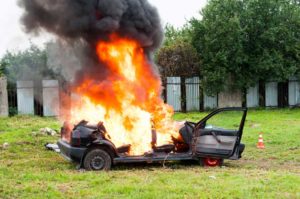 car smoking on fire